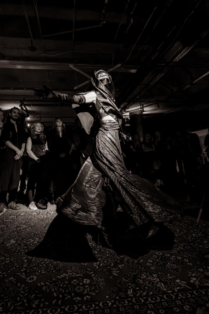 The veiled dancer — slow spin.