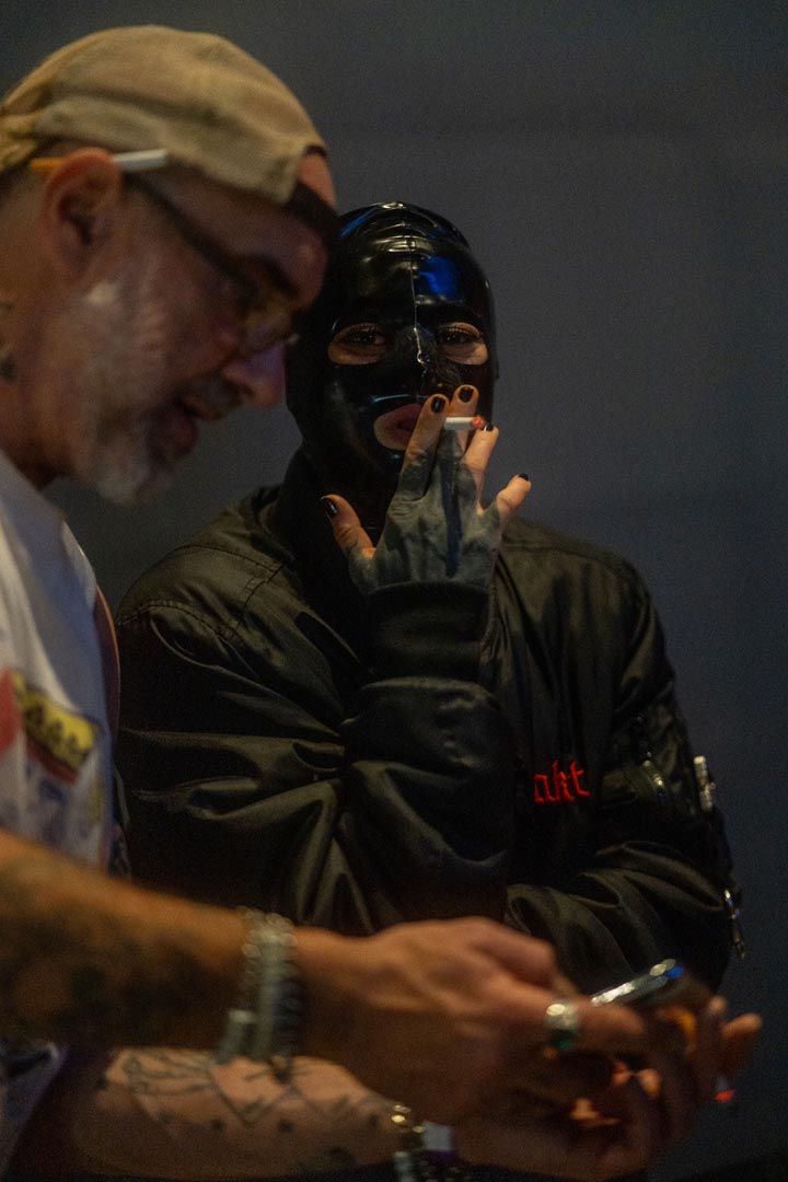 Mask and conversation — backstage.