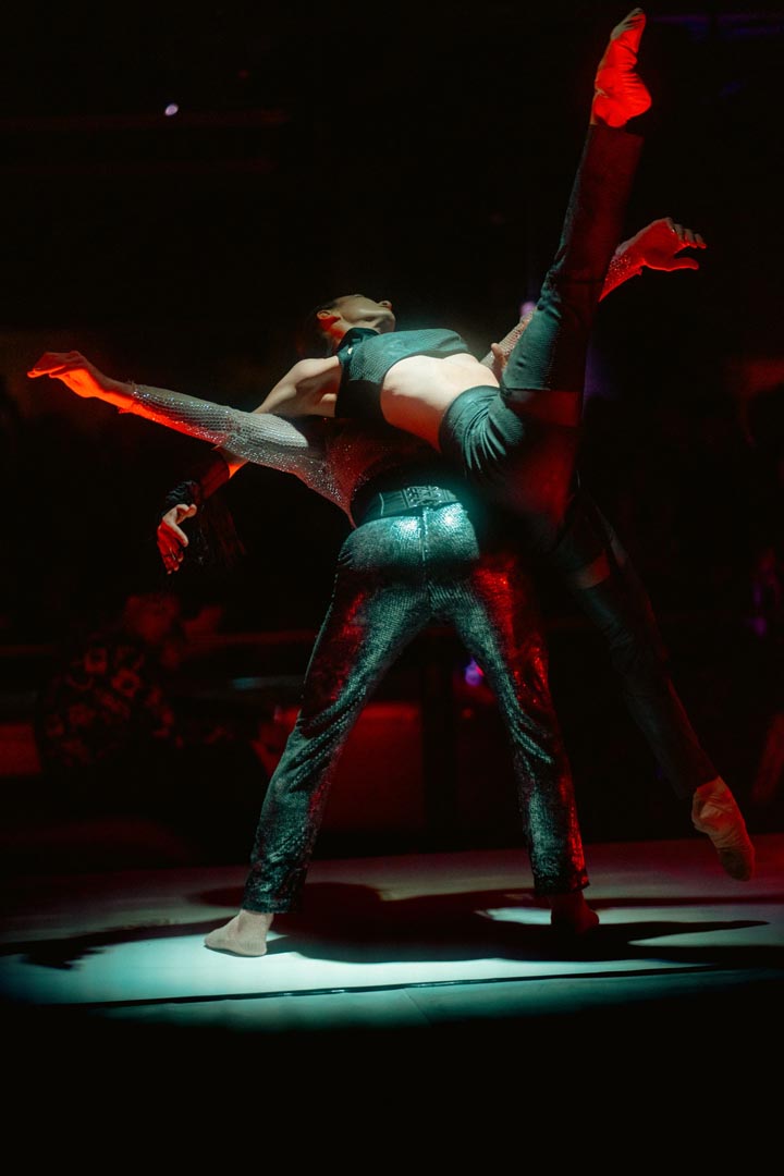 Duo — suspended on the spotlight.