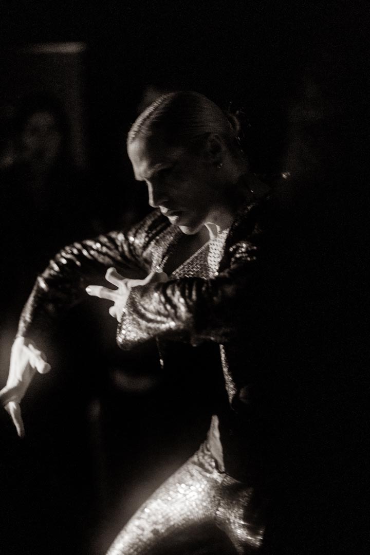 Hands in motion — silver dance.