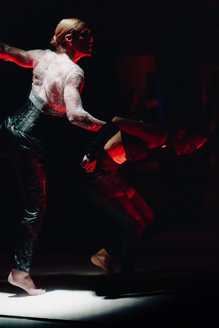 Lift — bodies finding tension.